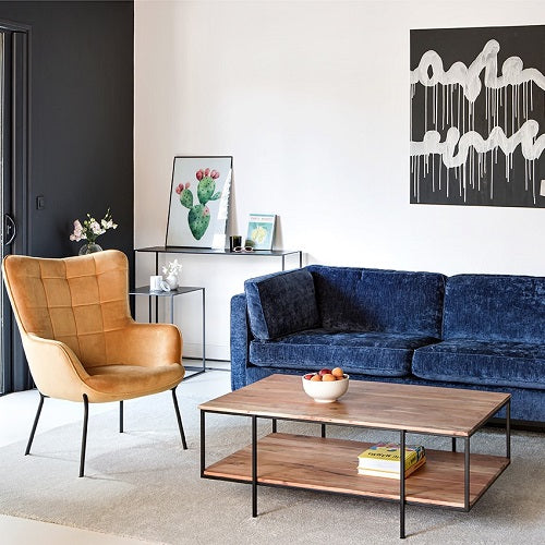 sofá y sillón de terciopelo en una decoración contemporánea y minimalista