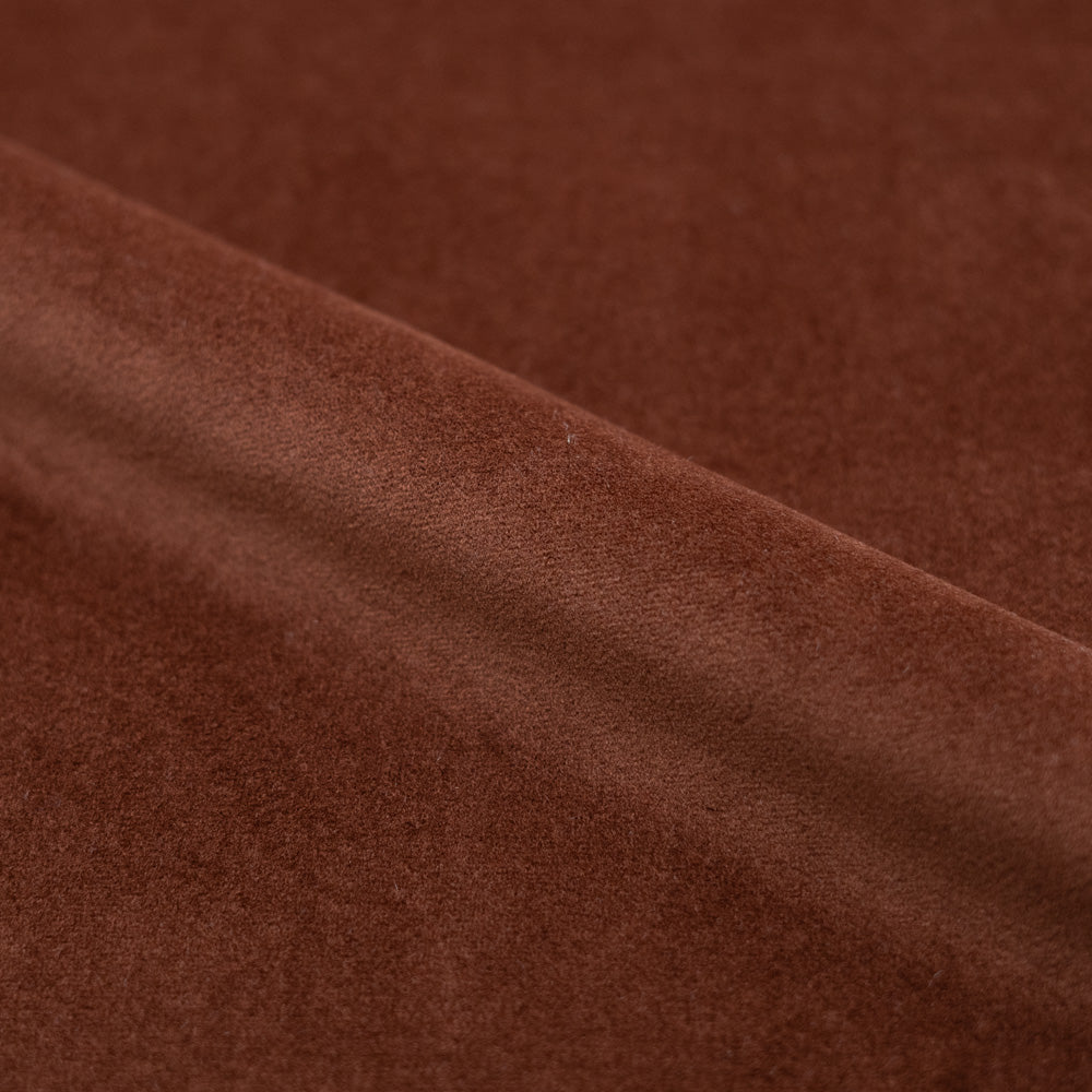 Fauteuil pivotant Ysé en velours rouille