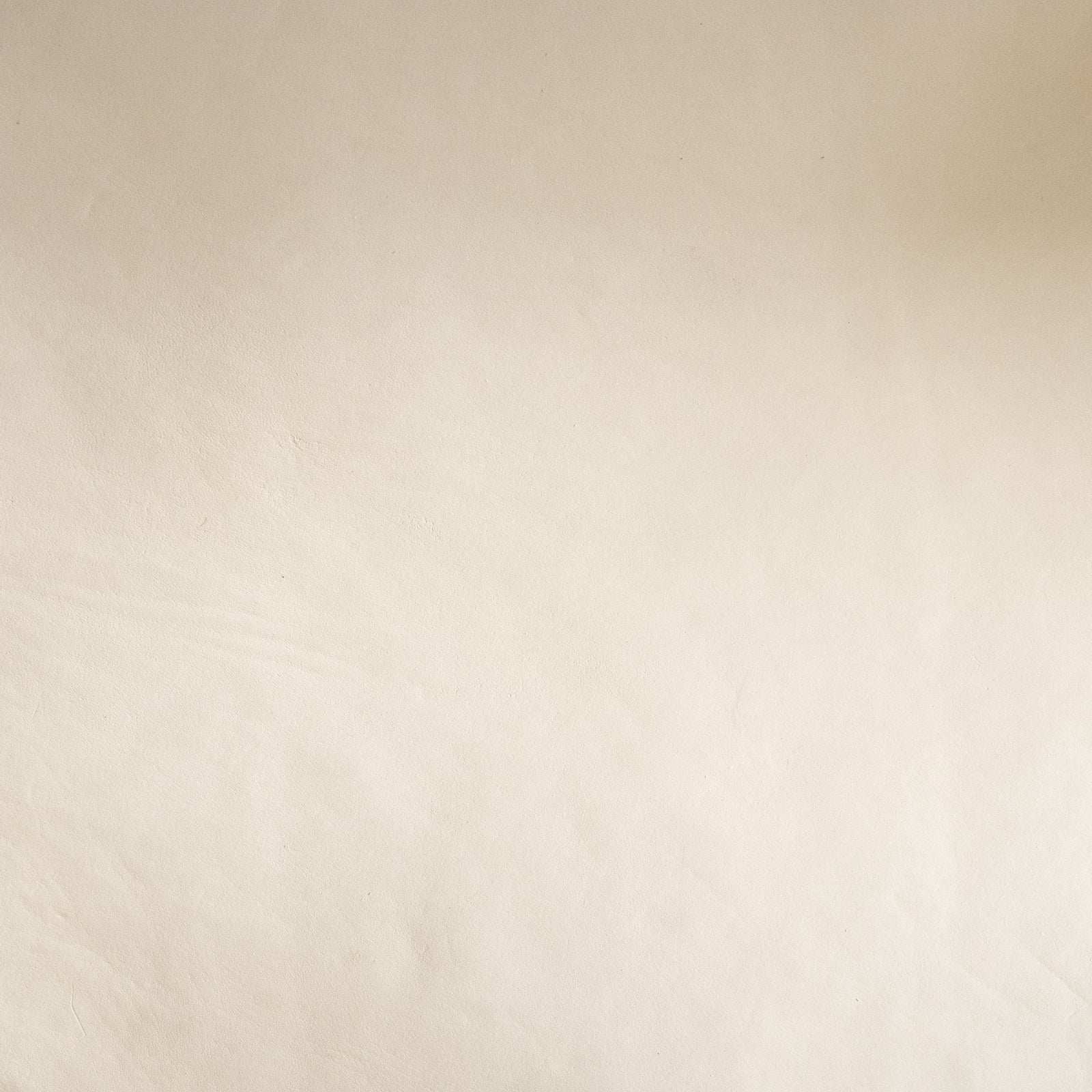 kuna fauteuil en cuir tresse et bois