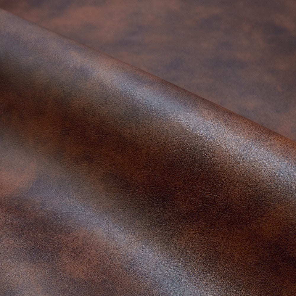 zoom matiere cuir marron synthetique